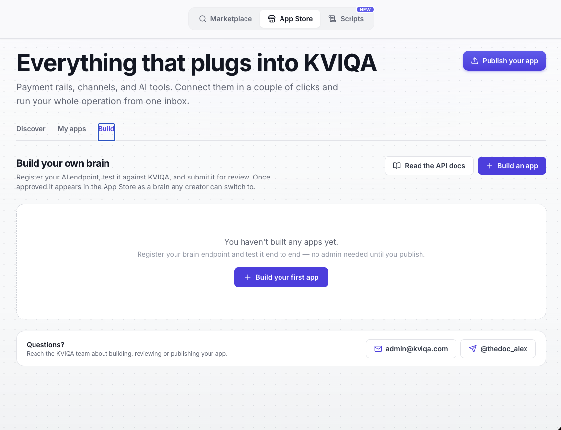 The Build tab of the KVIQA App Store, titled Build your own brain, with Read the API docs and Build an app buttons, an empty state that reads You haven't built any apps yet with the note Register your brain endpoint and test it end to end, no admin needed until you publish, and a Questions strip linking admin@kviqa.com and @thedoc_alex.